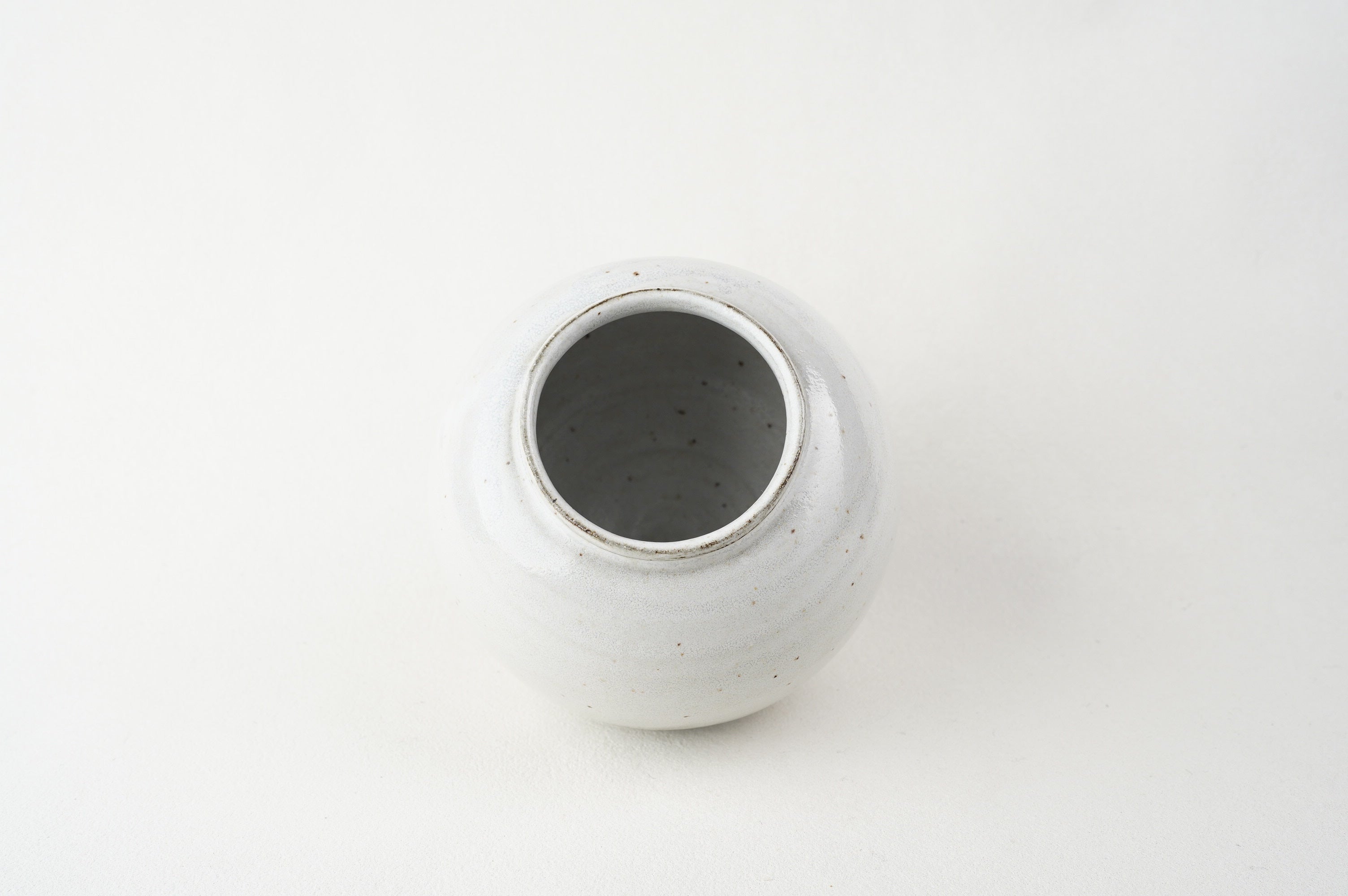 White-Glazed Black Clay Moon Jar